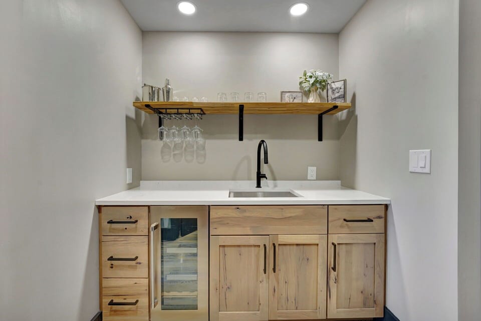 first level kitchenette with bar ware