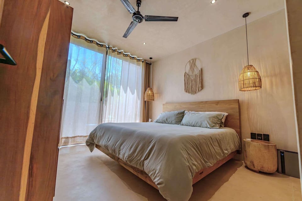 Lovely bedroom, spacious and beautifully illuminated with natural light, creating a warm and romantic atmosphere.
