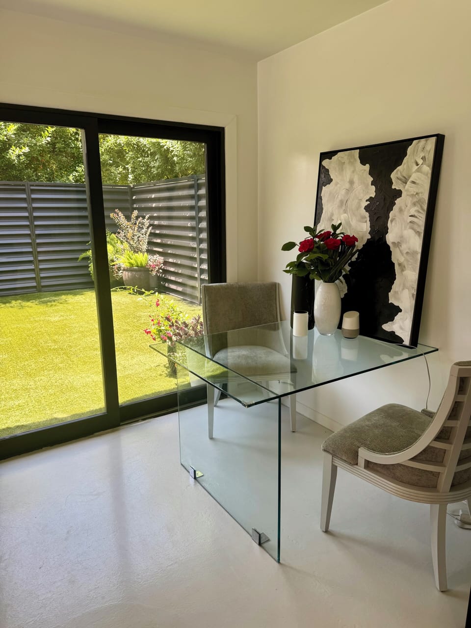 Cozy nook off kitchen! Has access to a small private patio.