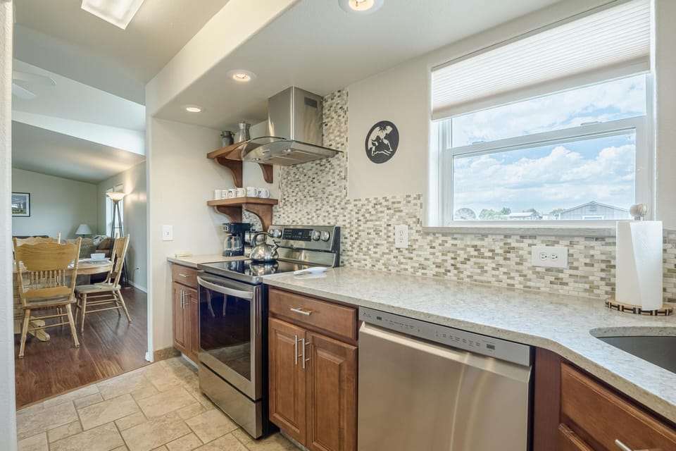 Modern appliances and charming touches included.