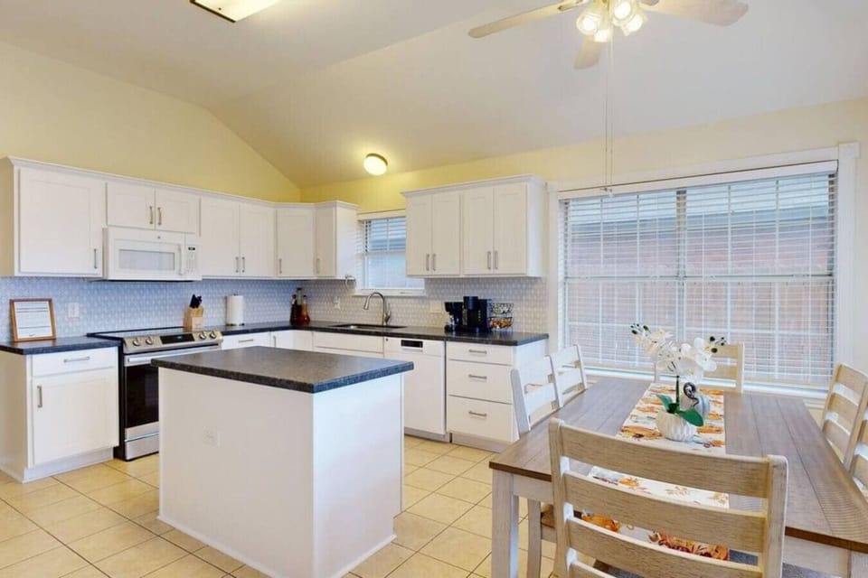 Enjoy a fully stocked kitchen and a dining space that comfortably seats six.