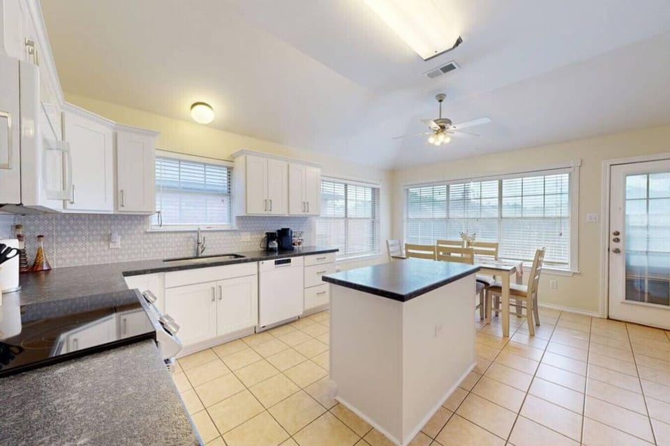 Enjoy a fully stocked kitchen and a dining space that comfortably seats six.