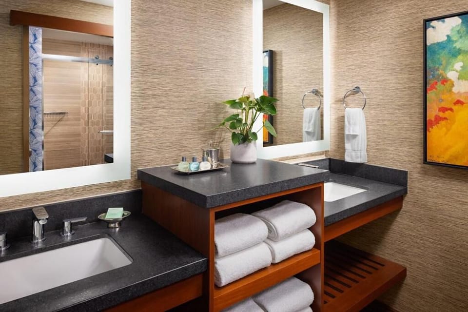 Indulge in a spa-like sink area with plush towels.