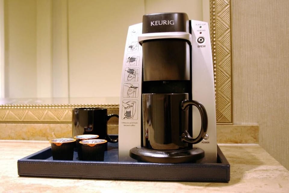 Sip fresh morning coffee from your private in-room Keurig setup.