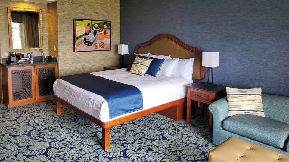 Recharge beside the sofa with soft lighting and island-inspired decor.