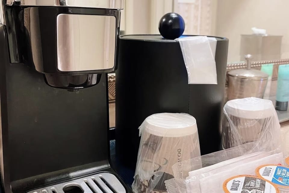 Brew quick coffee with convenient in-room essentials provided.