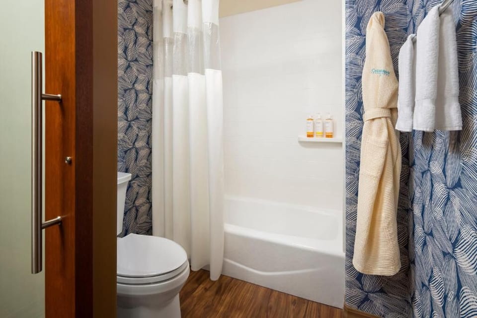 Rinse off comfortably in a clean tub-shower after sun-filled days.