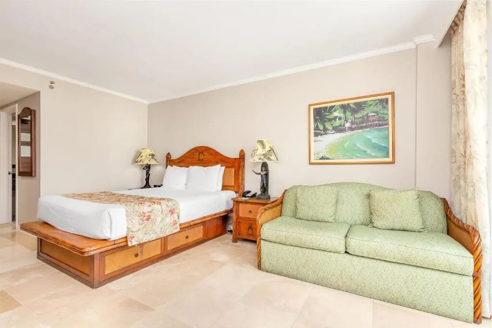 Lounge comfortably beside the bed after a day exploring.