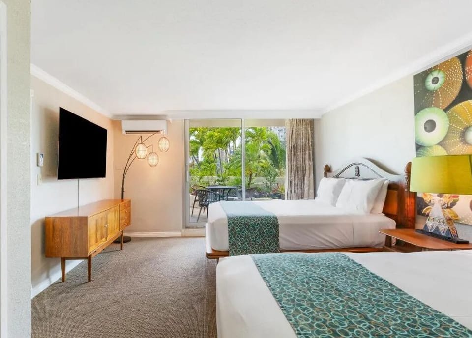 Settle in for restful nights in this bright, spacious room.