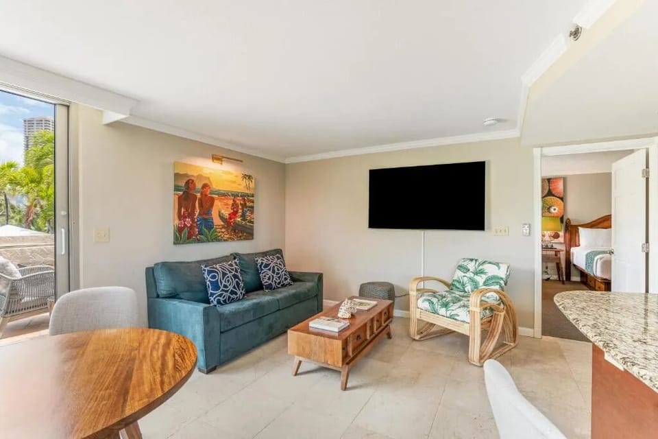 Relax in a roomy bedroom designed for easy, cozy stays.