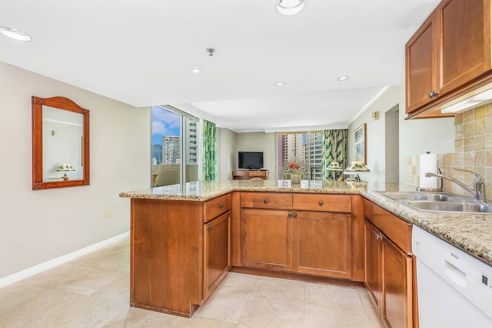 Cook with ease in the open kitchen with generous counters.