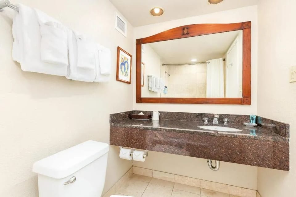Freshen up easily with a clean vanity and plush towels.