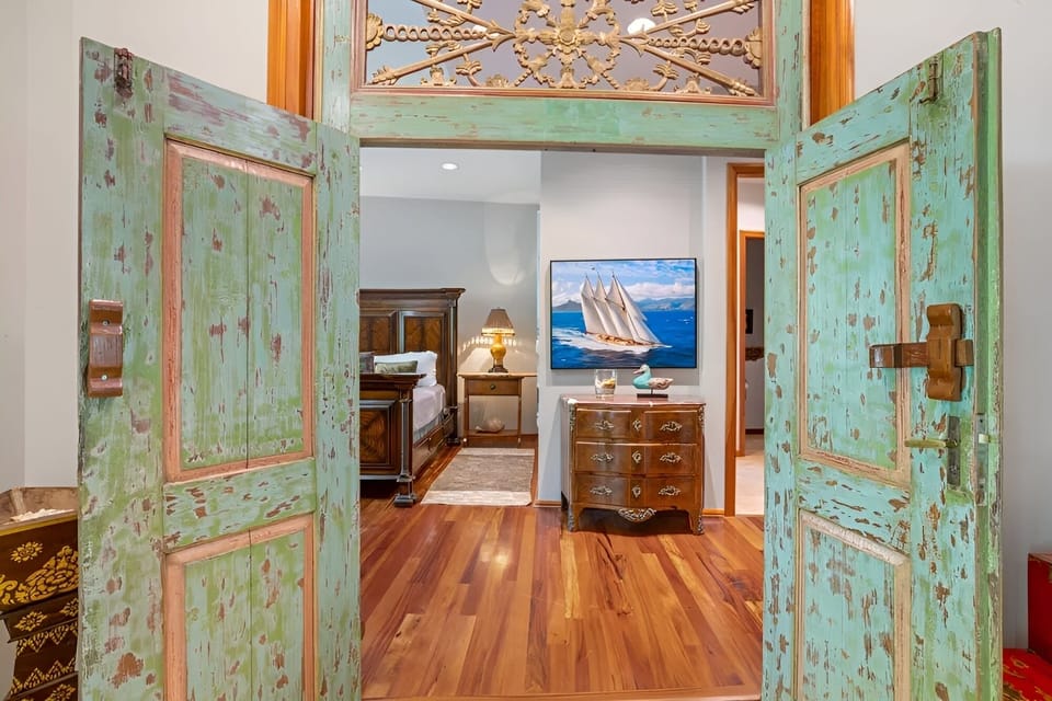 Step through charming doors into your private, restful retreat.