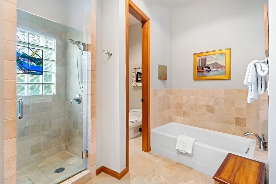 Refresh after the beach with a bright shower and deep tub.