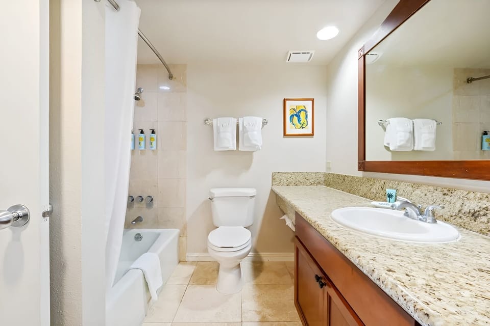 Refresh after the beach in a clean, bright full bath.