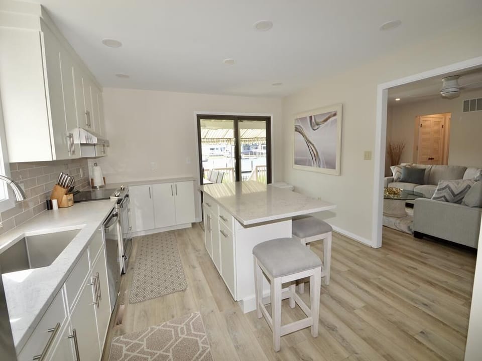Kitchen open to Covered Deck