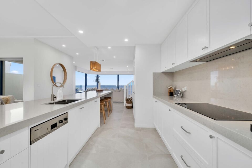 High-end kitchen with modern finishes and ocean views