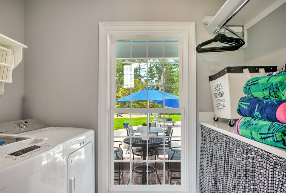 Pool Towels are offered and stored in Laundry Room
