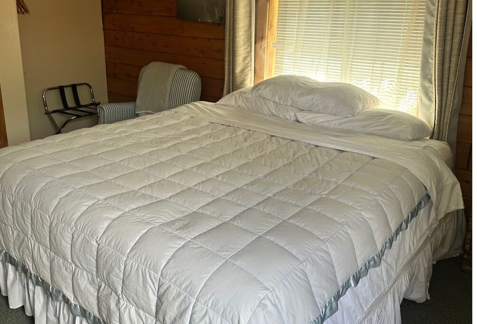The room features a king bed.