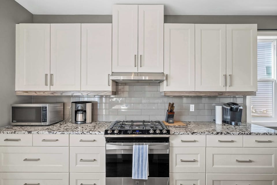 Modern appliances meet sleek design and thoughtful layout