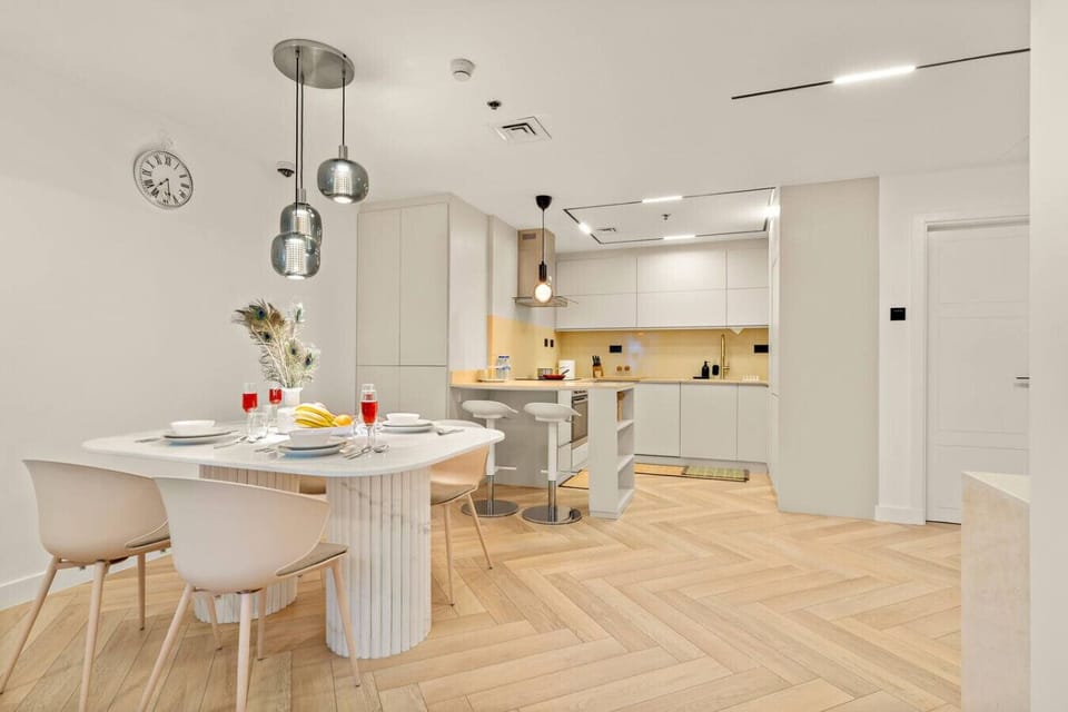 Dining Area: Sleek design meets elegance in this inviting space, perfect for meals and memories!