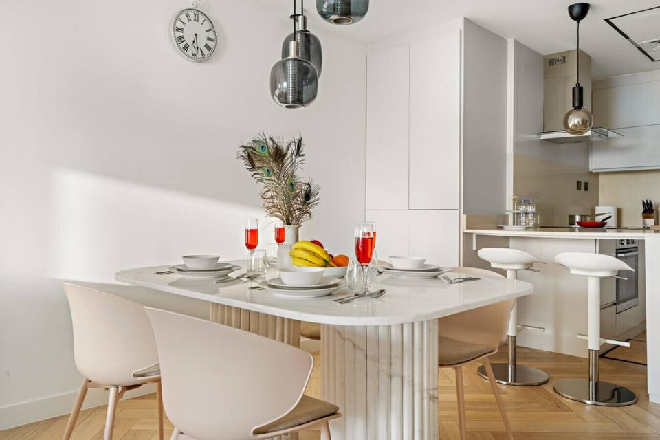 Dining Area: Stylish marble table set for delightful meals & laughter in vibrant Dubai!