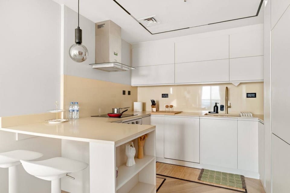 Bright Kitchen: Cook up a feast in this modern kitchen with sleek design and stylish accents!