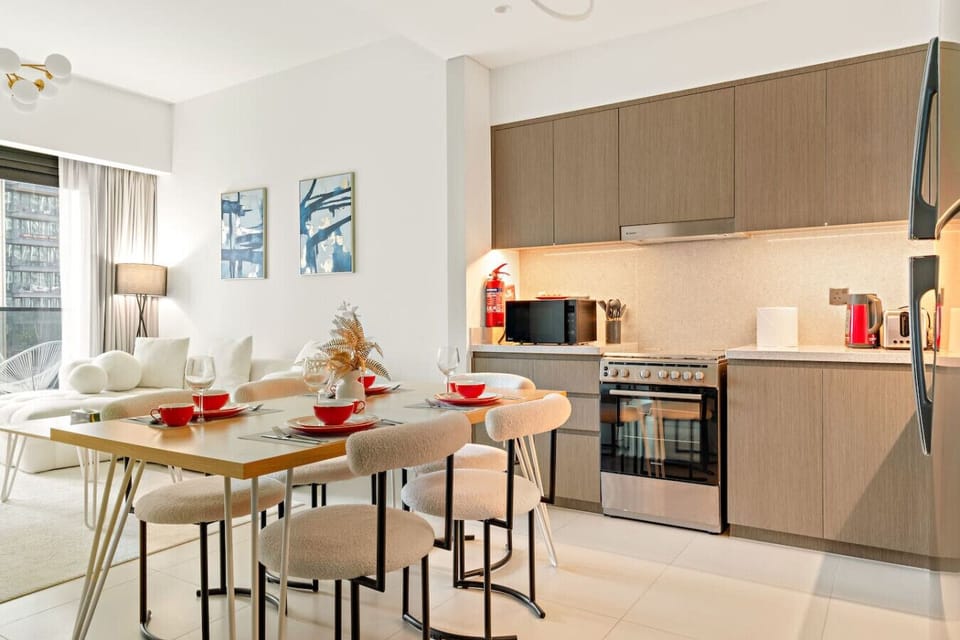 Dining Room: Modern elegance awaits with chic decor and a vibrant dining area for your gatherings!