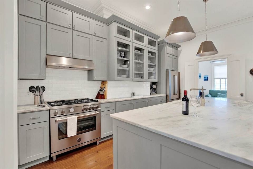 Light-filled kitchen designed for gathering + cooking with ease.