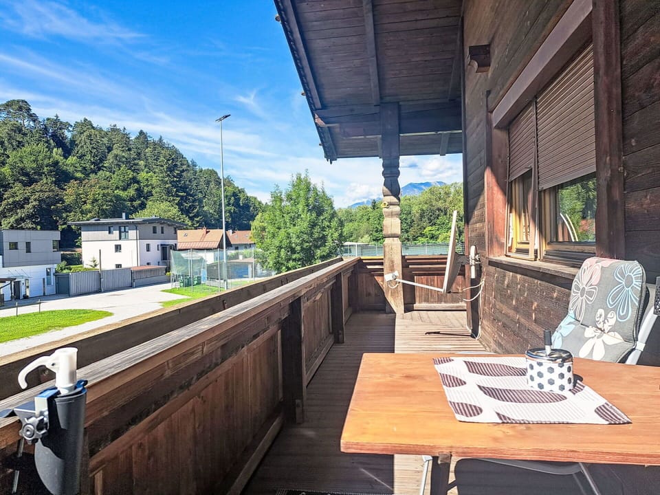 Wood, Balcony, Hardwood, Wood Stain, Plank, Porch, Shade, Siding, Daylighting, Deck
