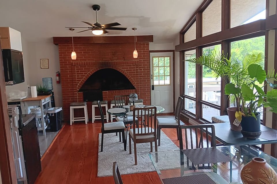 Seating for 12 people  in chairs and bench seating.