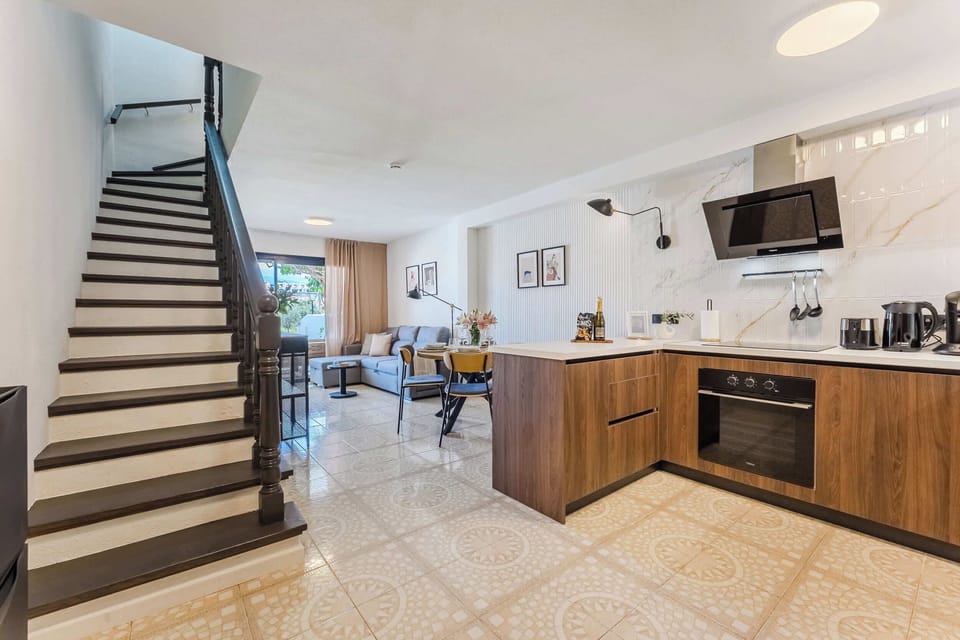 Welcome to Fairways Premium Duplex Suite — Stylish Two-Story Living with Open Kitchen, Modern Comfort & Direct Access to the Garden