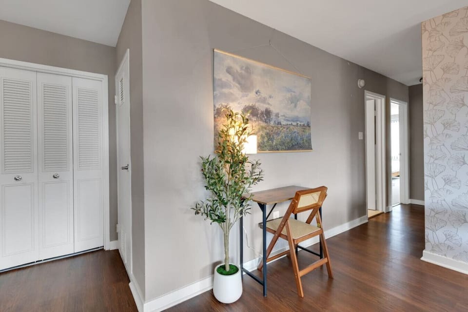 Tucked just off the main hall, this workspace corner offers privacy for calls or focused work while keeping you steps from the kitchen and living room.