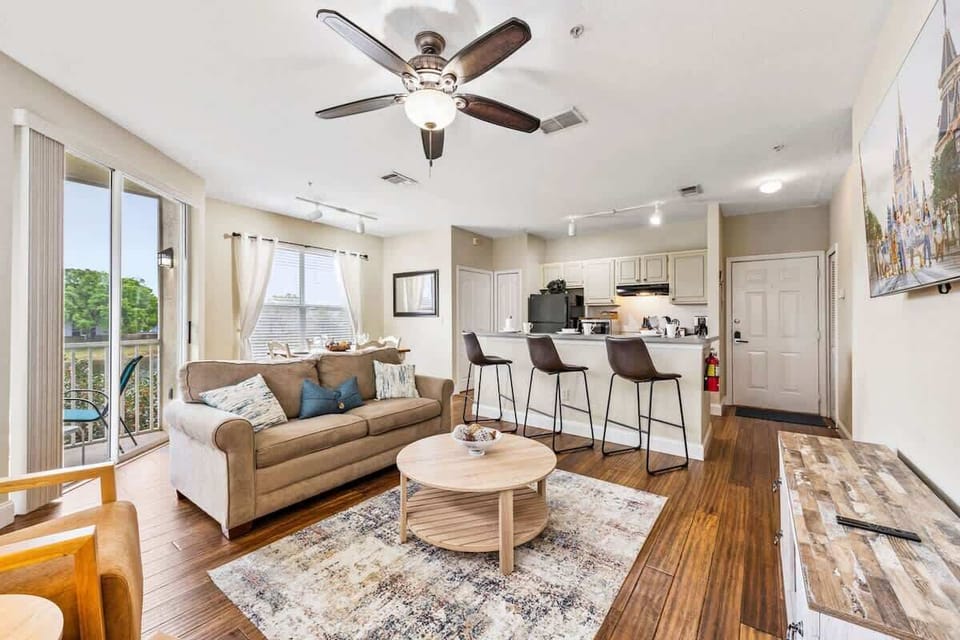 - Open concept living space with warm tones, cozy seating & natural light
- Seamless flow from the living room to the kitchen makes it perfect for gathering & dining
- Step onto the balcony for fresh air or unwind inside with all the comforts of home