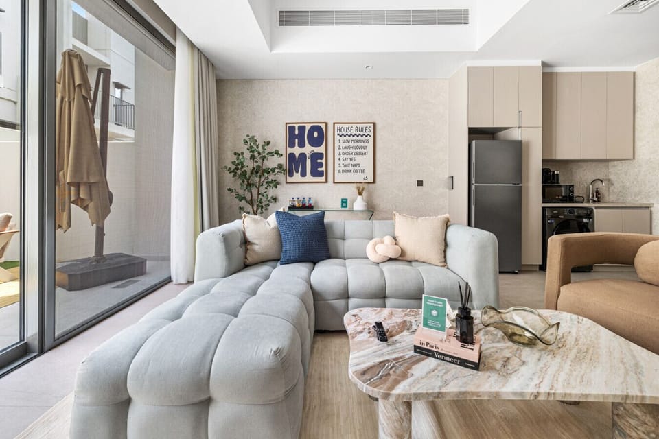 Bright living and dining area with a cozy setup.
