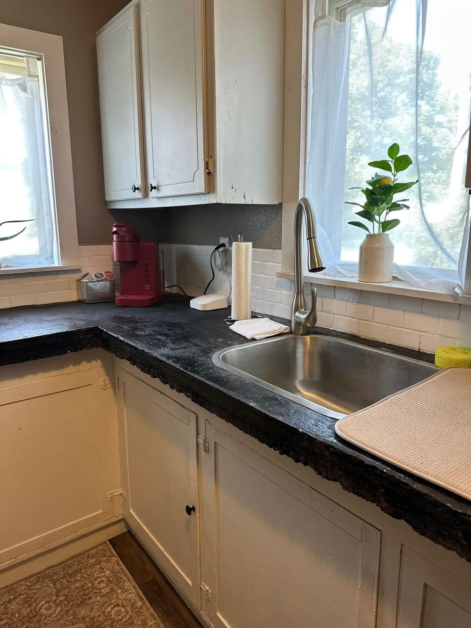 Full kitchen with all new amenities and original cabinets!