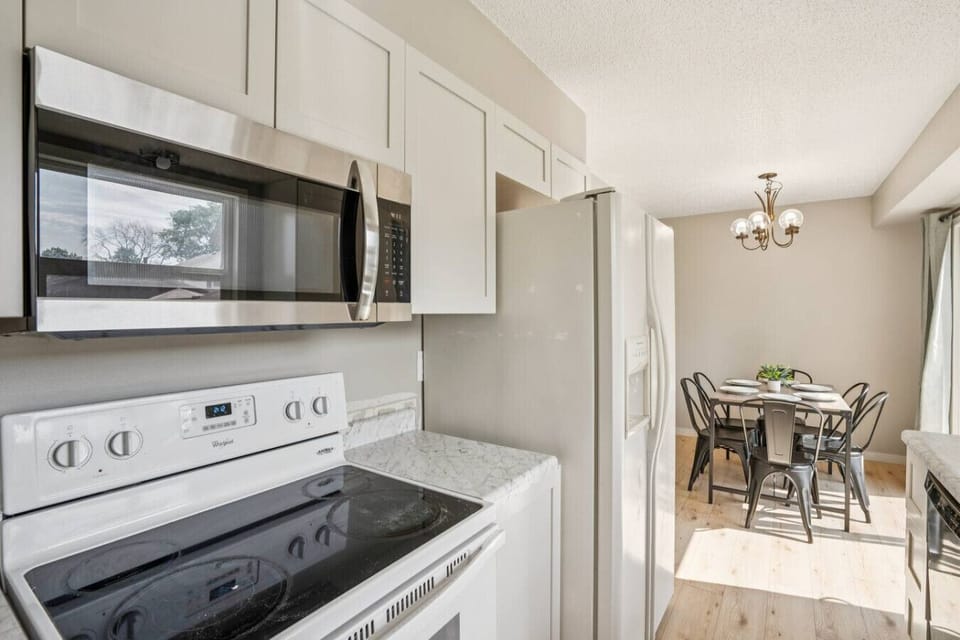 Cooking essentials in open kitchen layout