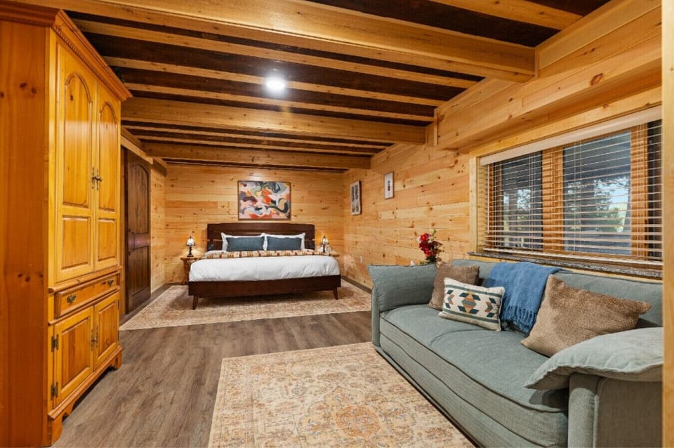 Cozy bedroom with natural wood interior