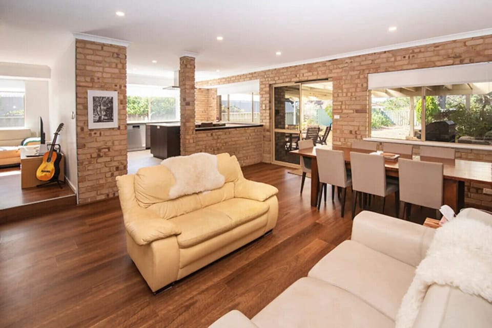 Living room, Dining area, Kitchen and Fireplace w/ Reverse-cycle Air-conditioning