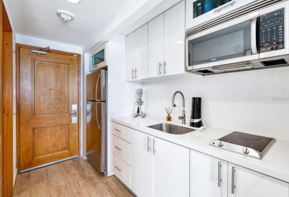 Master bedroom has a second full size kitchen