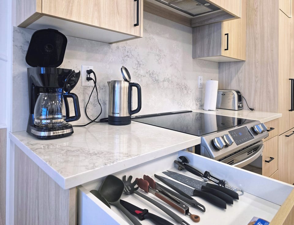 Fully equipped kitchen, stove cookware, coffee setup, long stay ready
