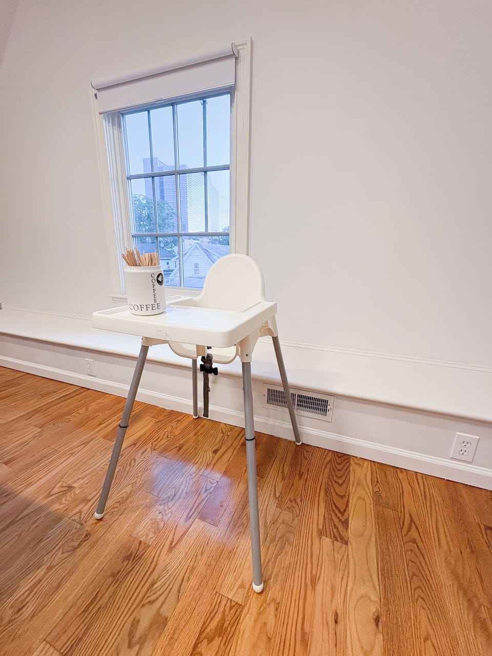 Dining Area: Equipped with a high chair for the baby guest