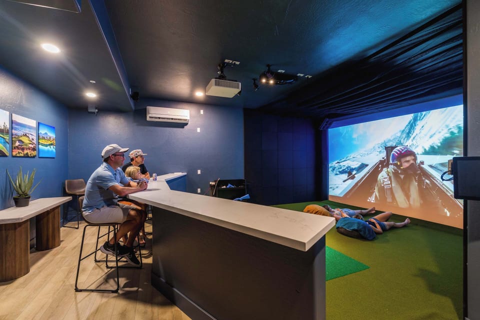 Immersive Entertainment Awaits – Watch movies, play golf, or enjoy interactive gaming in this fully equipped home theater and sports simulator room. Perfect for family nights or friendly competitions.