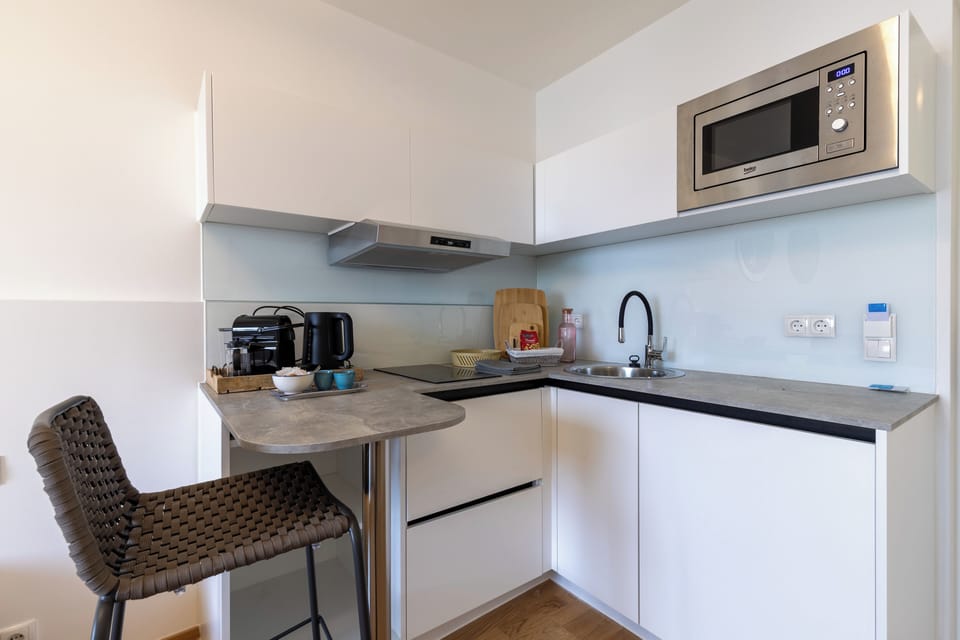 Fully stocked kitchenette with everything you need for light cooking.