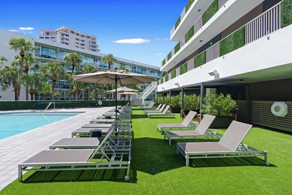 Pool umbrellas, sun loungers