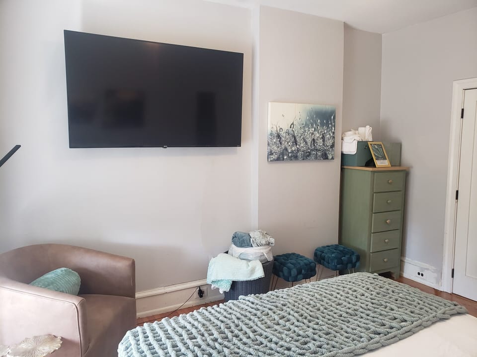 Queen Bed, Swivel reading chair, Window bench seat