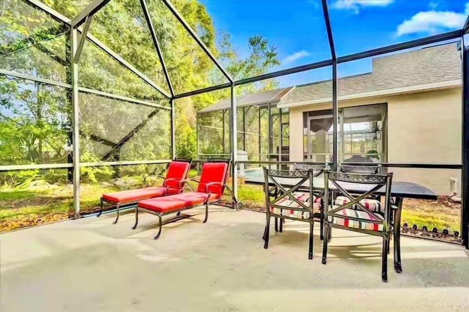 Deck space surrounded by lush trees