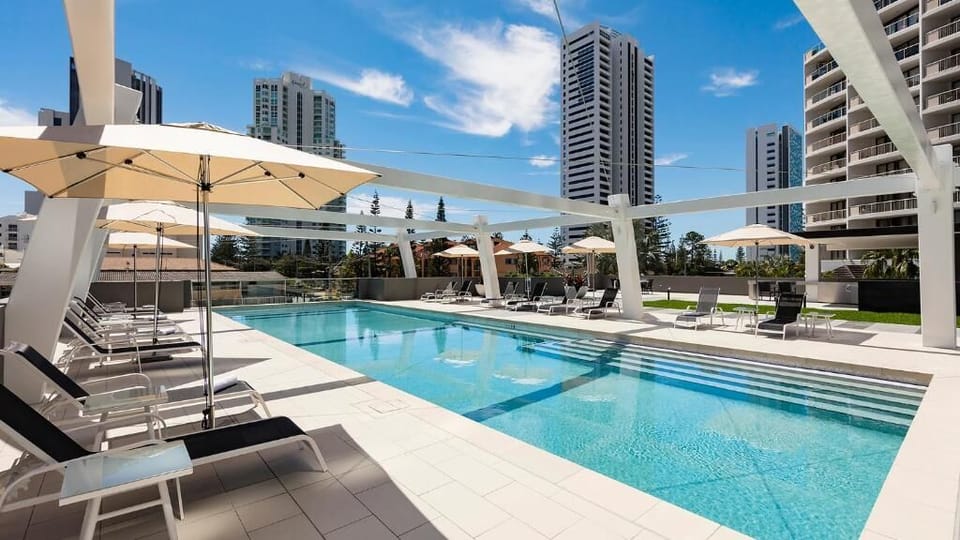 Unwind and soak up the sun or swim laps to start your day in the shared outdoor pool.