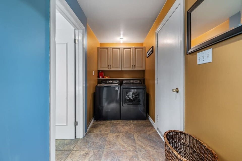 Laundry room with washer and dryer