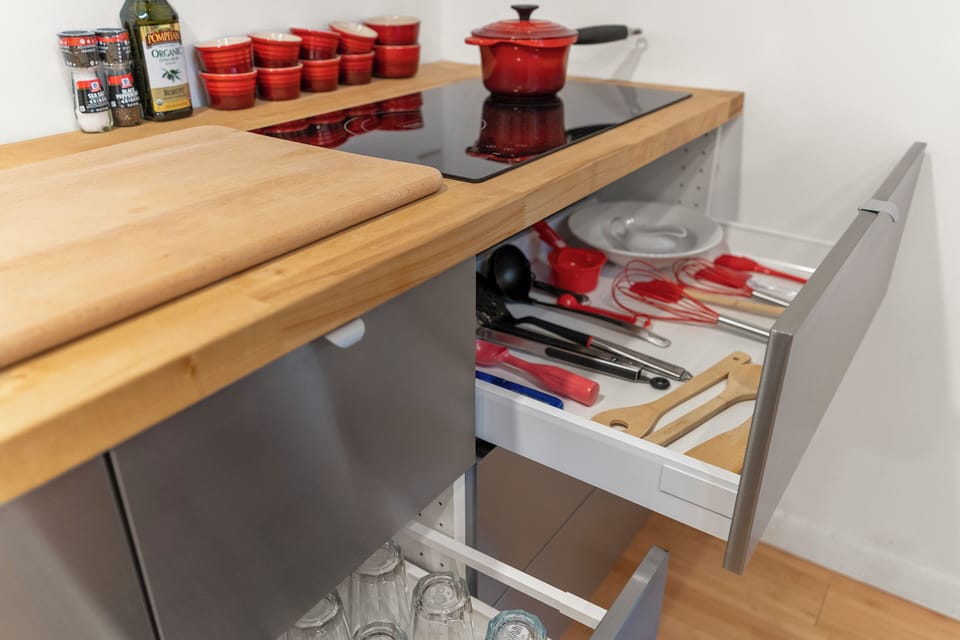Fully stocked with all utensils, dishes, glasses and pots and pans.